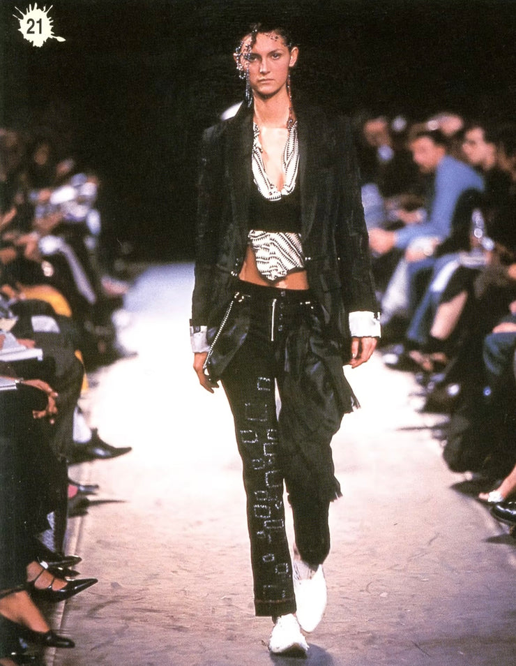UNDERCOVER - SS03 "SCAB" Slim pants with embellishment details and flap pockets (runway)