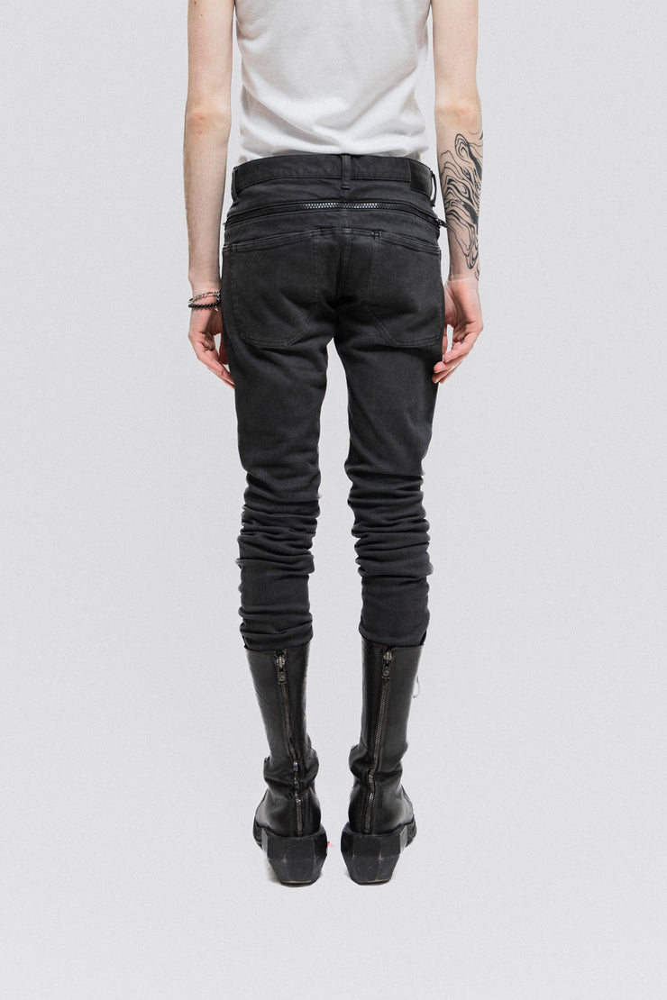 UNDERCOVER - SS15 "Adventure" Skinny jeans with ripped knees and zipper details