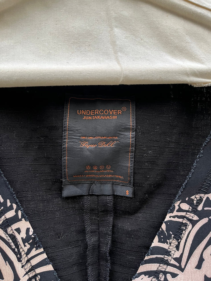 (New Arrival) UNDERCOVER - FW03 "Paper Doll" Printed wool vest with snap buttons