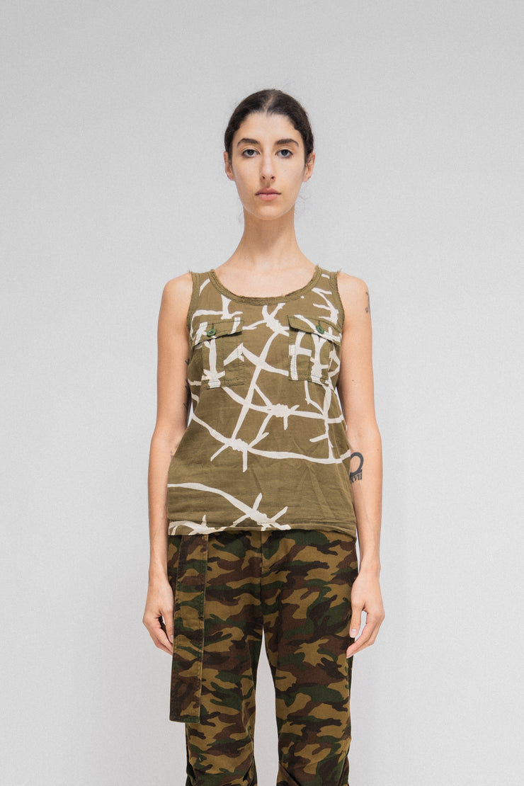 JUNYA WATANABE - SS04 Barbed wire tank top with front and back pockets (based on the men&