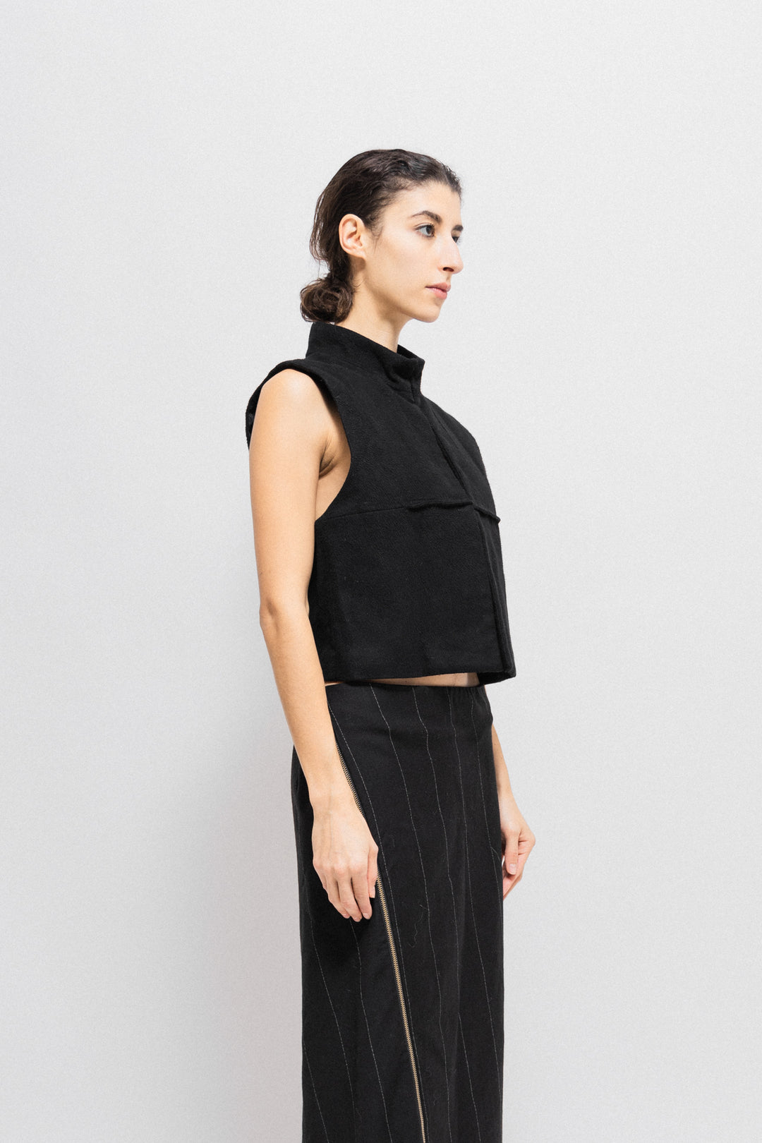 ANN DEMEULEMEESTER - FW13 Sleeveless vest with a high collar – L