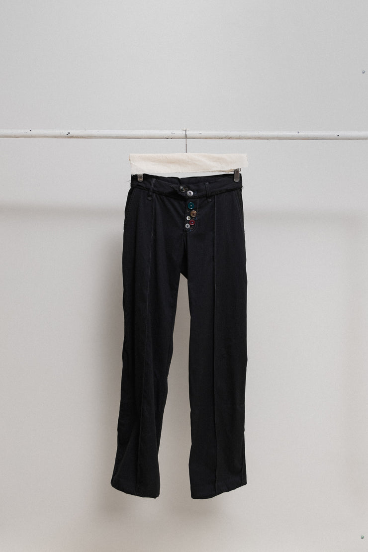 UNDERCOVER - FW04 "But Beautiful, part parasitic, part stuffed" Pinstripe pants with scar stitches, multi buttoning and padded parts