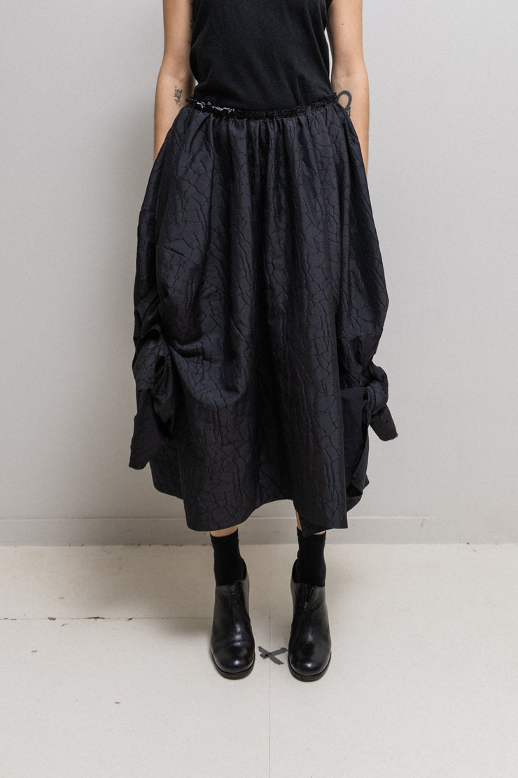 COMME DES GARCONS COMME DES GARCONS - Voluminous skirt with embossed pattern and knot details