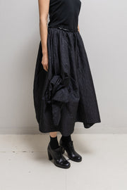 COMME DES GARCONS COMME DES GARCONS - Voluminous skirt with embossed pattern and knot details