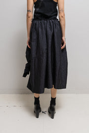 COMME DES GARCONS COMME DES GARCONS - Voluminous skirt with embossed pattern and knot details