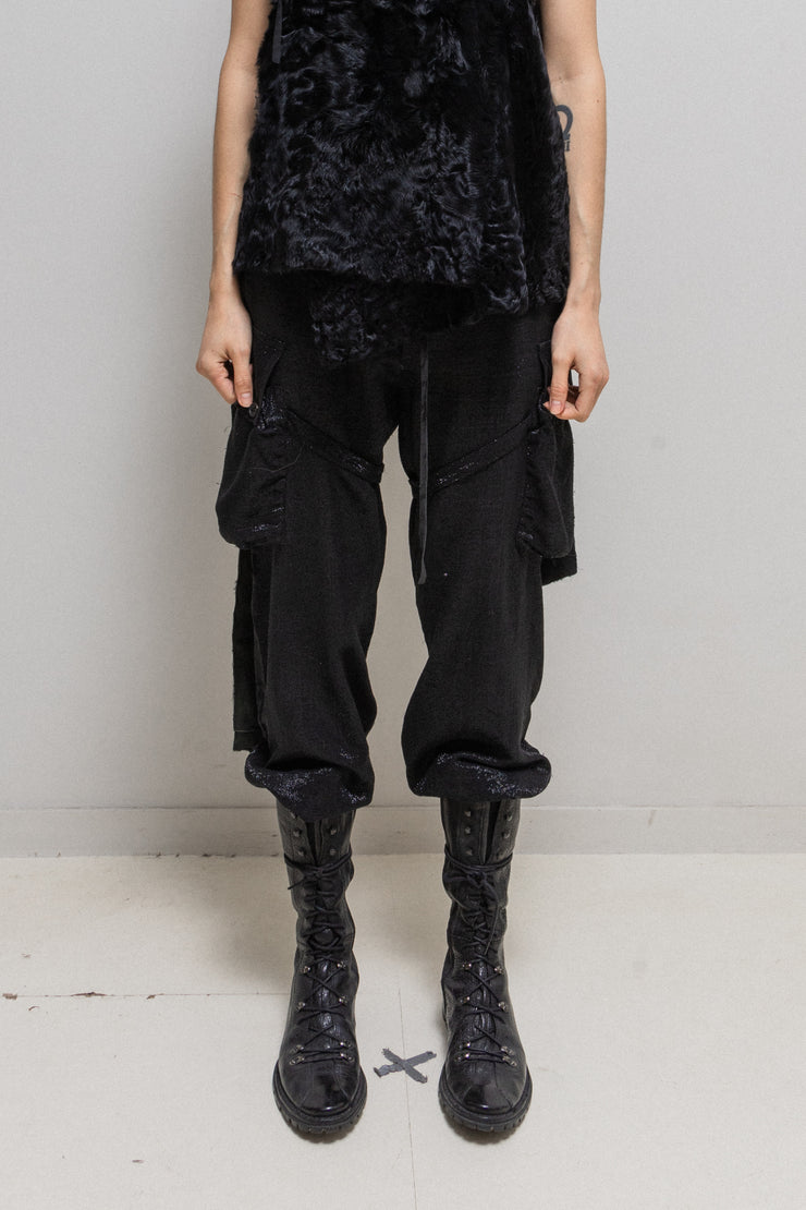 ANN DEMEULEMEESTER - FW02 Wide pants with metallic threads, parachute pockets + straps and leather lacing (runway)