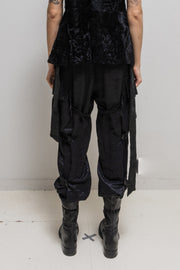 ANN DEMEULEMEESTER - FW02 Wide pants with metallic threads, parachute pockets + straps and leather lacing (runway)