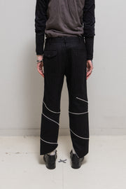 COMME DES GARCONS HOMME PLUS - FW18 "White Shock" Wool pinstripe pants with spiral leg zippers (runway)