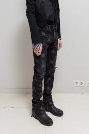 TAKAHIRO MIYASHITA THE SOLOIST - Star printed jeans with ripped knees