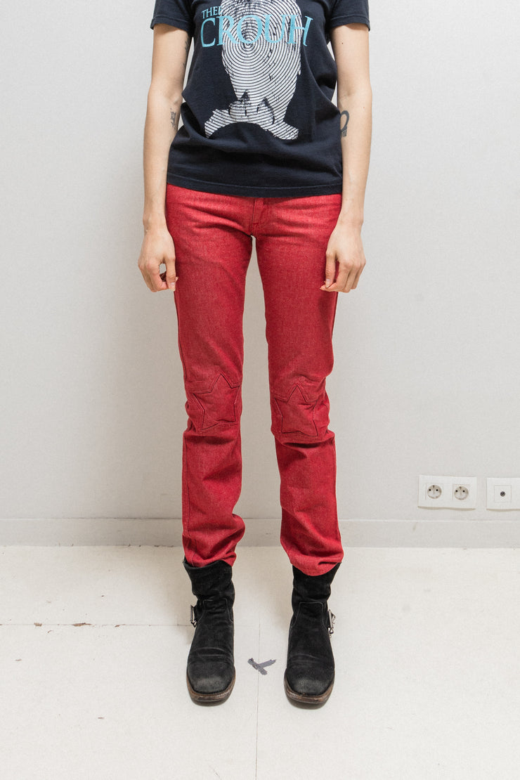 UNDERCOVER - FW00 "Melting Pot" Red slim jeans with star knee patches