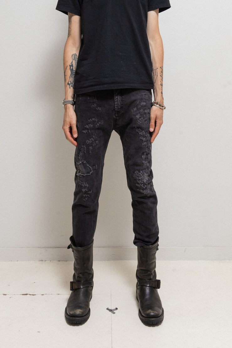 POÈME BOHÉMIEN - Ripped denim pants