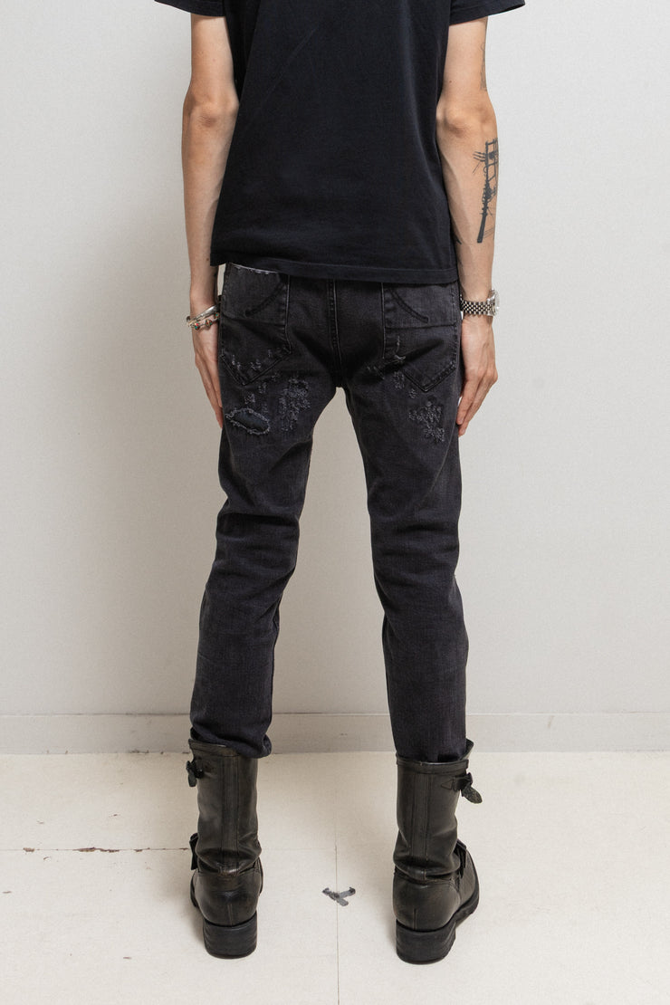 POÈME BOHÉMIEN - Ripped denim pants