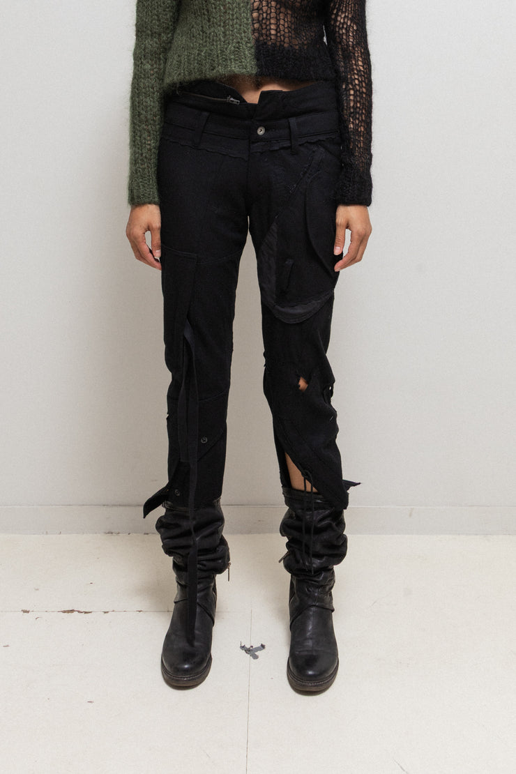 JUNYA WATANABE - FW06 Reworked patchwork wool pants with leg straps and waist zipper (runway)