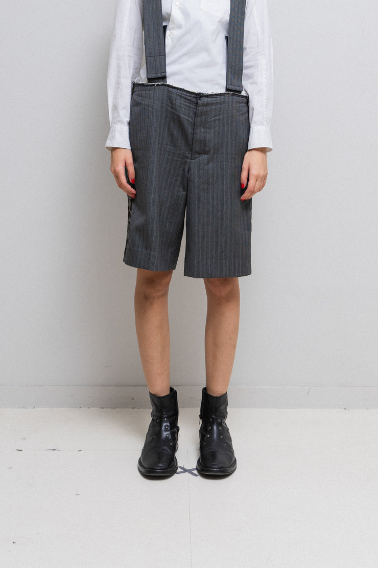 COMME DES GARÇONS HOMME PLUS - SS15 « Soldier of Peace » Striped shorts with camo details and suspenders