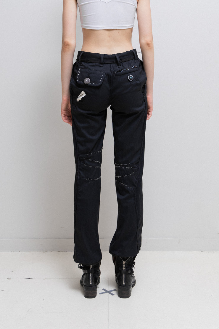 UNDERCOVER - FW04 "But Beautiful, part parasitic, part stuffed" Pinstripe pants with scar stitches, multi buttoning and padded parts