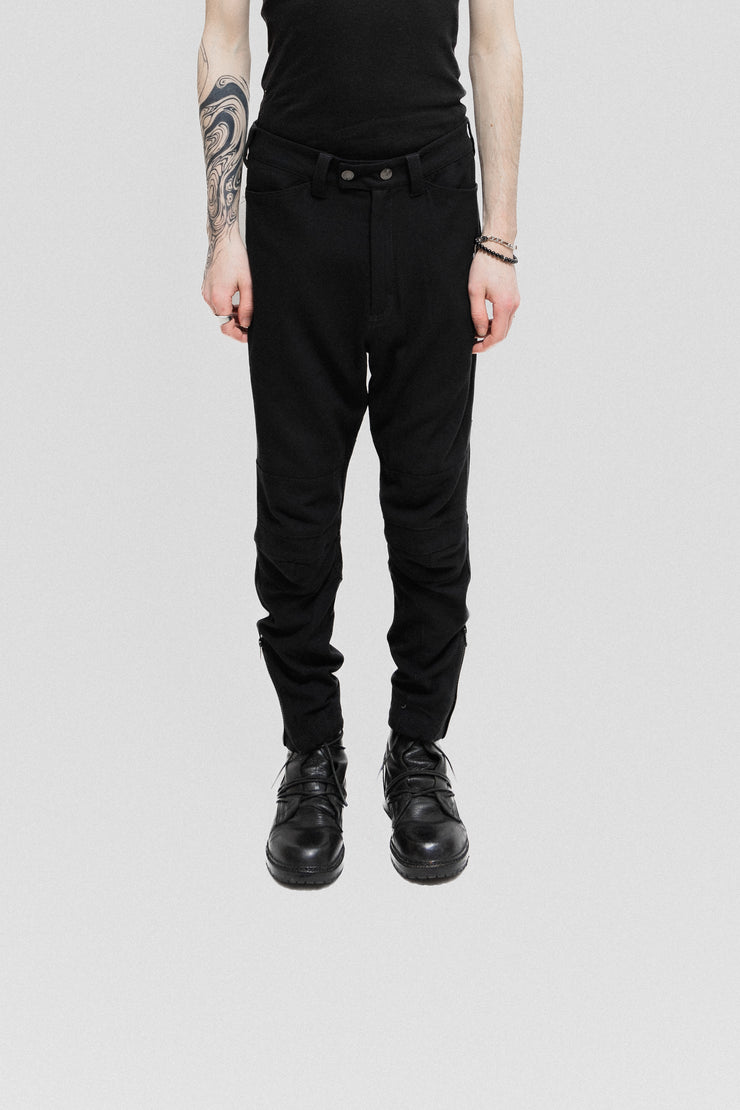 ANN DEMEULEMEESTER - Stretch pants with knee details and ankle zippers