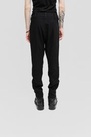 ANN DEMEULEMEESTER - Stretch pants with knee details and ankle zippers