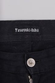 YASUYUKI ISHII - Flared cotton pants with a "Cross Pattée" studded leather patch