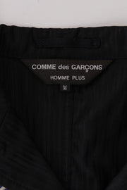 COMME DES GARCONS HOMME PLUS - FW15 Tattoo printed tail jacket, art by Joseph Ari Aloi (runway)