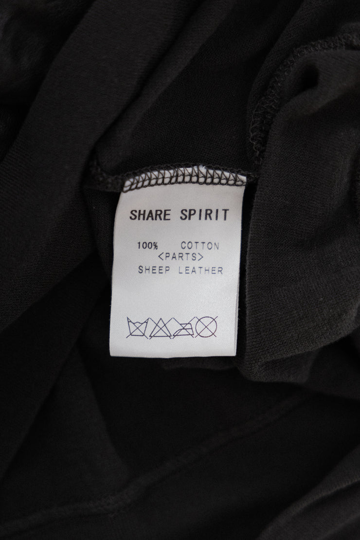 SHARE SPIRIT - Long top with a leather pocket