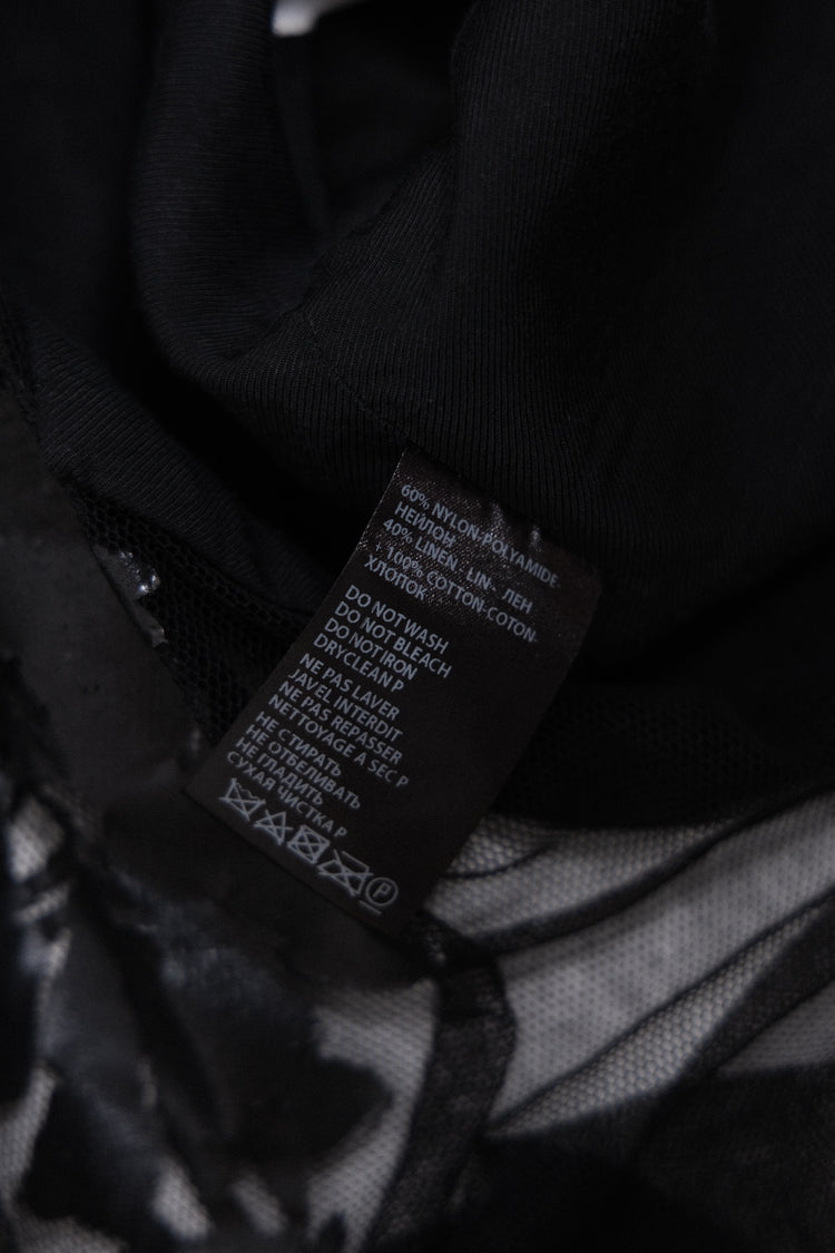 ANN DEMEULEMEESTER - SS14 Button up vest with a mesh back and