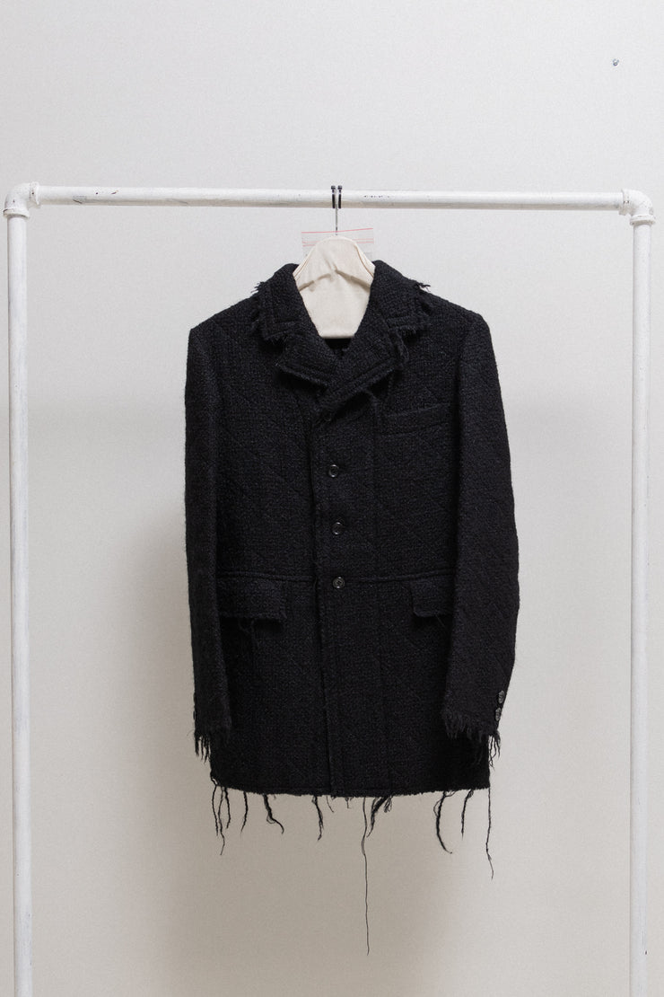 JUNYA WATANABE - FW05 Textured wool coat with quilted lining and frayed edges