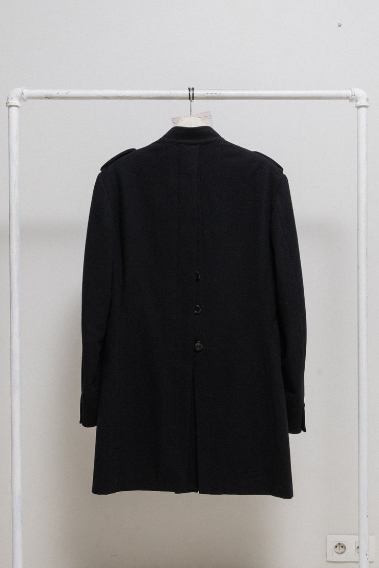 YOHJI YAMAMOTO POUR HOMME - FW07 Officer wool coat with back buttoning creating a slit (runway)