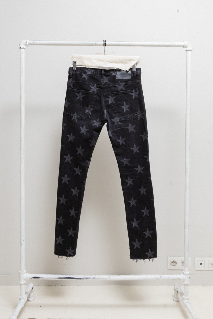 TAKAHIRO MIYASHITA THE SOLOIST - Star printed jeans with ripped knees