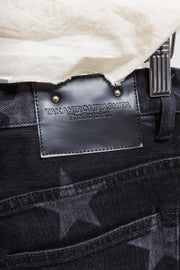 TAKAHIRO MIYASHITA THE SOLOIST - Star printed jeans with ripped knees