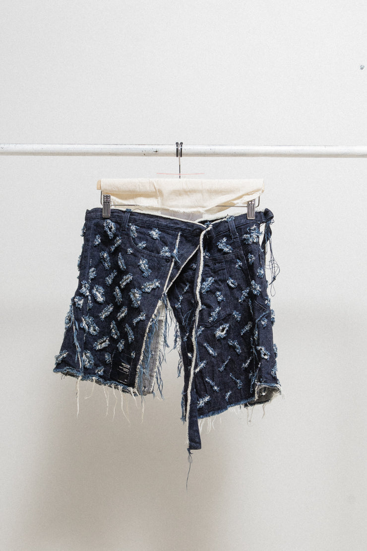 UNDERCOVER - FW00 "Melting Pot" Perforated and ripped adjustable denim apron