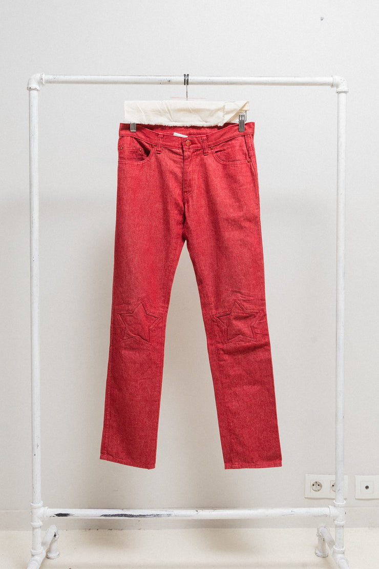 UNDERCOVER - FW00 "Melting Pot" Red slim jeans with star knee patches