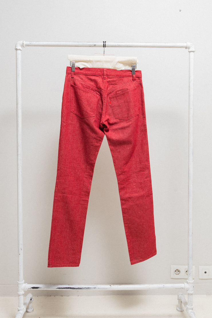 UNDERCOVER - FW00 "Melting Pot" Red slim jeans with star knee patches