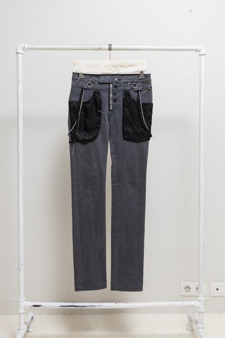 UNDERCOVER - SS03 "SCAB" Slim pants with embellishment details and flap pockets (runway)
