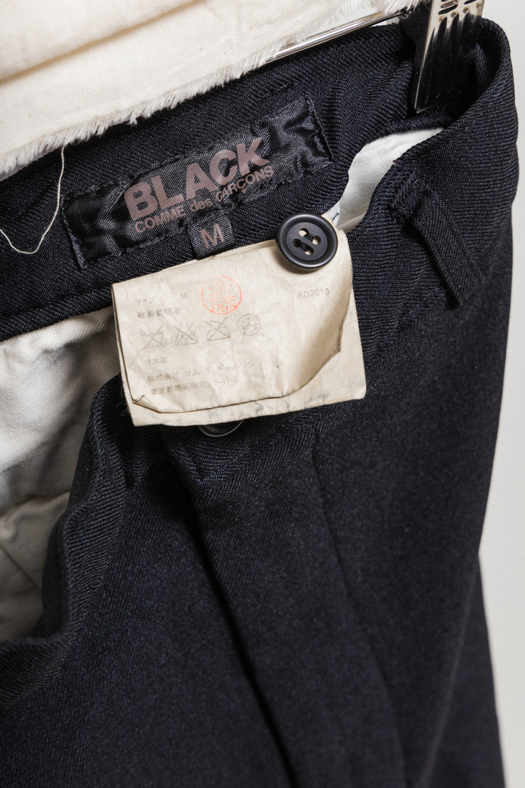 COMME DES GARCONS BLACK - Thick poly pants with leg straps