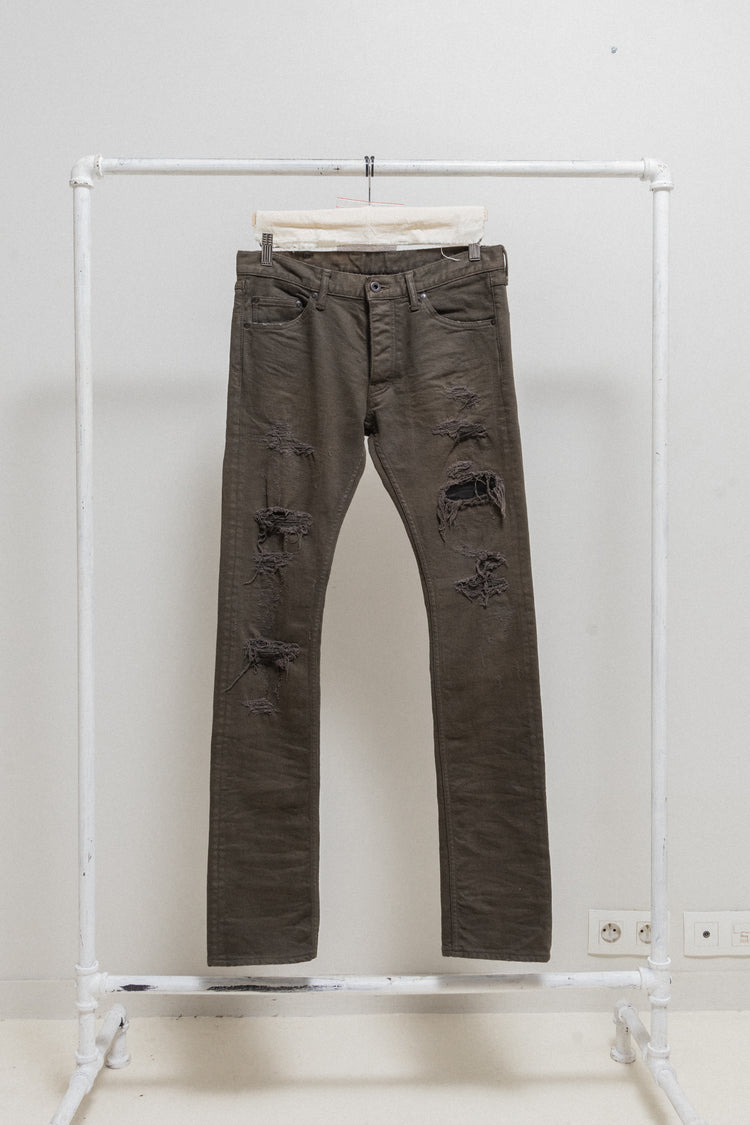 ISAMU KATAYAMA BACKLASH - Crashed denim pants with leather details