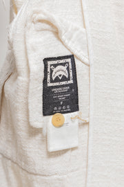 UNDERCOVER - SS03 "SCAB" Woven vest with ethnic collar and faux sewn on sleeves (runway)