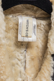 UNDERCOVER - FW02 “Witch’s cell division” Long shearling leather coat with waist straps and pocket detail