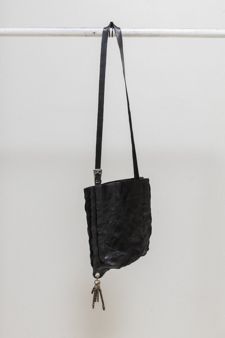 UNDERCOVER - SS04 "Languid"  Deformed leather bag with keys