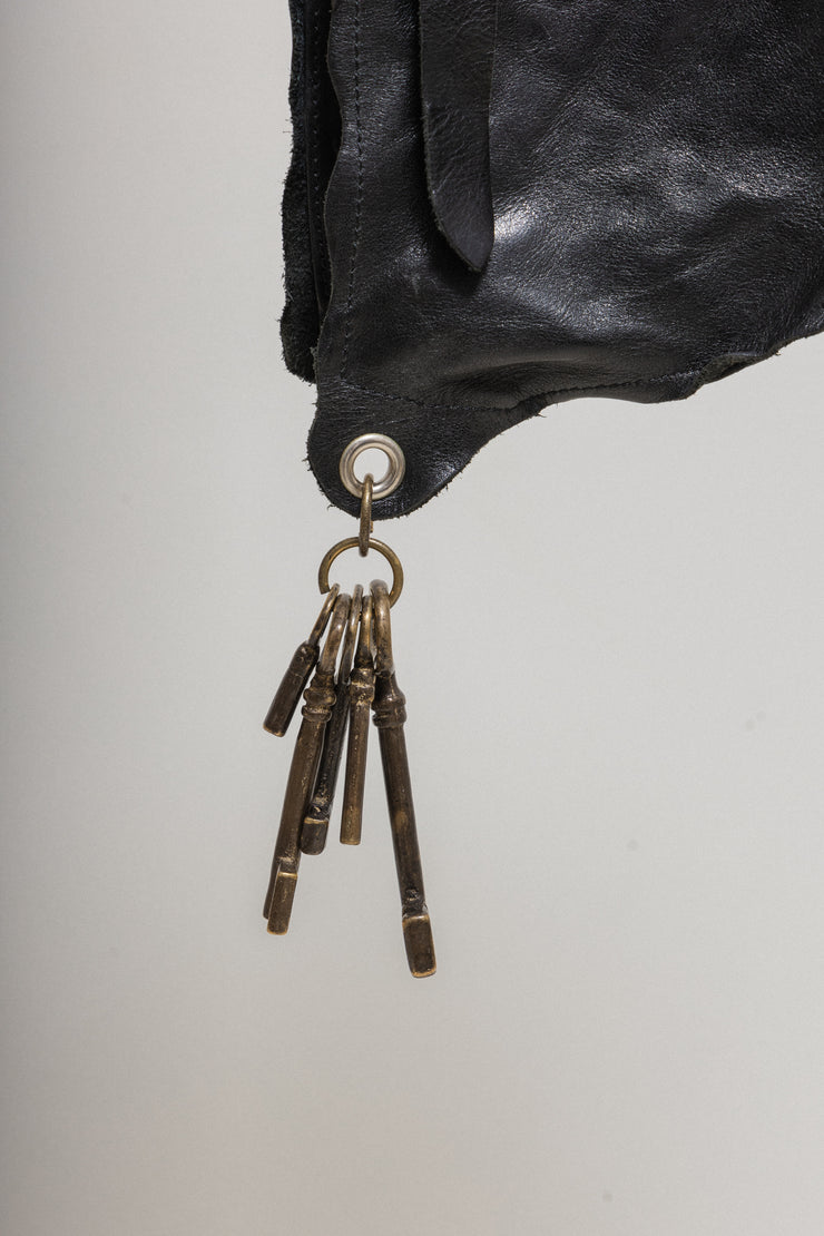 UNDERCOVER - SS04 "Languid"  Deformed leather bag with keys
