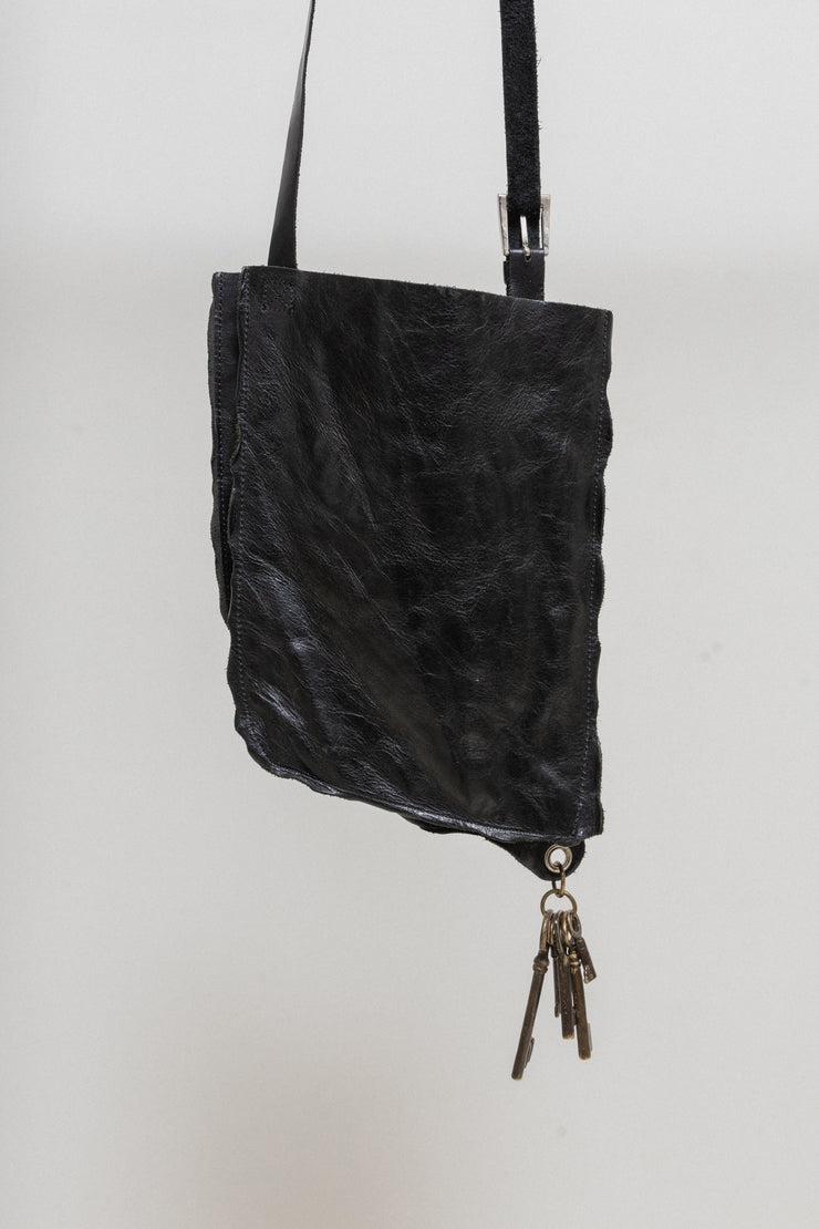 UNDERCOVER - SS04 "Languid"  Deformed leather bag with keys