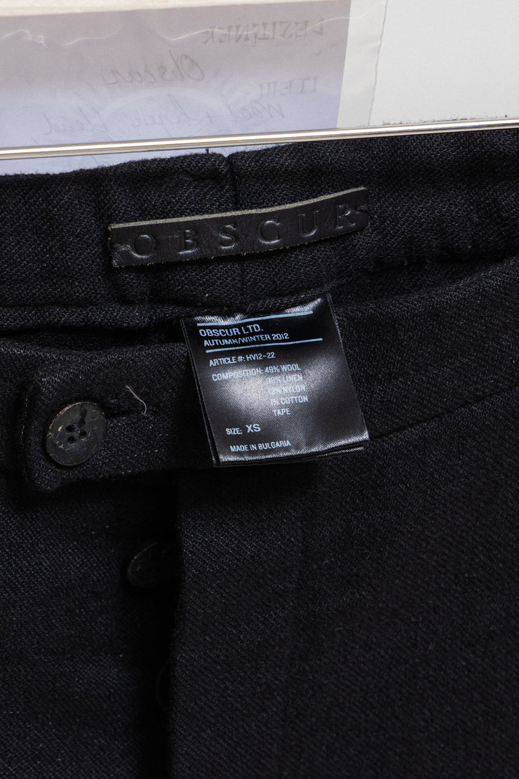 OBSCUR - Linen and wool blend pants with spiral frayed seam