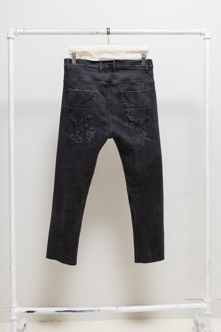 POÈME BOHÉMIEN - Ripped denim pants