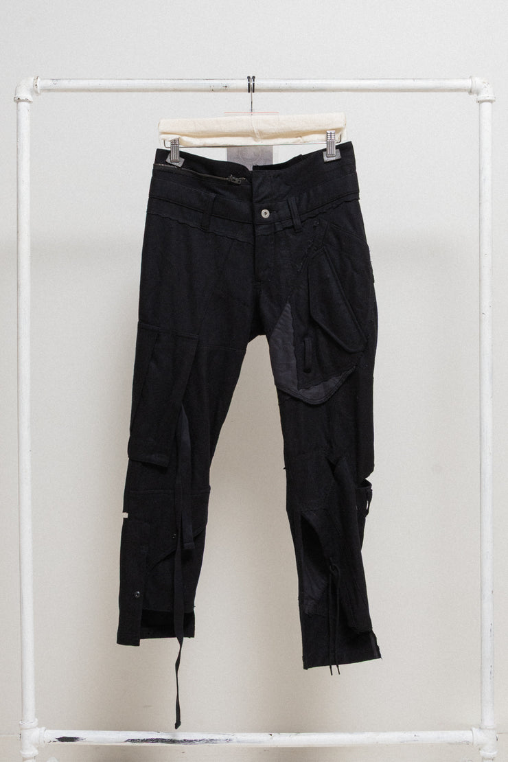 JUNYA WATANABE - FW06 Reworked patchwork wool pants with leg straps and waist zipper (runway)