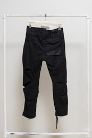 JUNYA WATANABE - FW06 Reworked patchwork wool pants with leg straps and waist zipper (runway)
