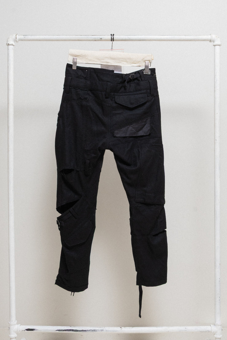 JUNYA WATANABE - FW06 Reworked patchwork wool pants with leg straps and waist zipper (runway)