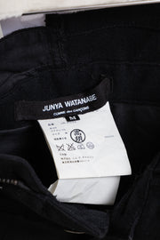JUNYA WATANABE - FW06 Reworked patchwork wool pants with leg straps and waist zipper (runway)