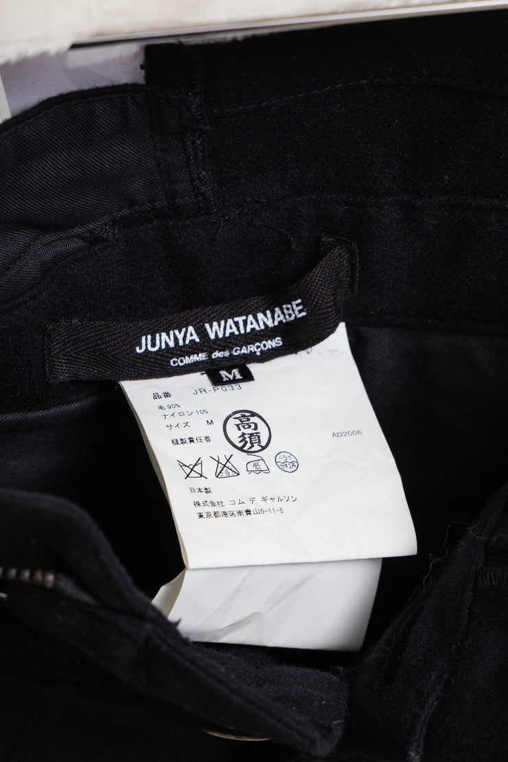 JUNYA WATANABE - FW06 Reworked patchwork wool pants with leg straps and waist zipper (runway)