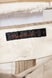 UNDERCOVER - SS05 « But Beautiful II » Wool skirt with floral cotton layer, embroidered teeth and eye button