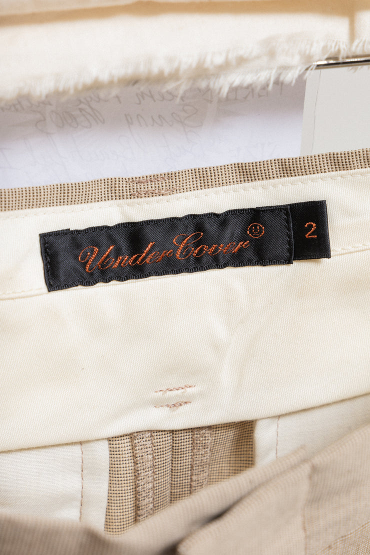 UNDERCOVER - SS05 « But Beautiful II » Wool skirt with floral cotton layer, embroidered teeth and eye button