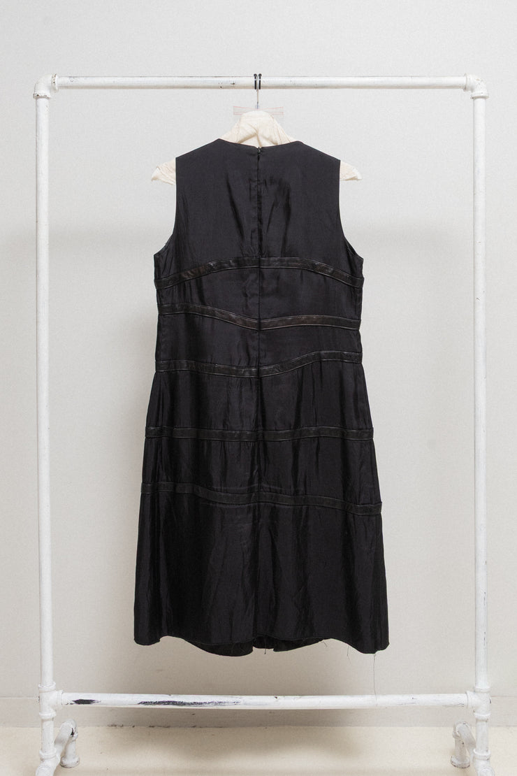 SANDRINE PHILIPPE - Nylon dress with leather buckled straps